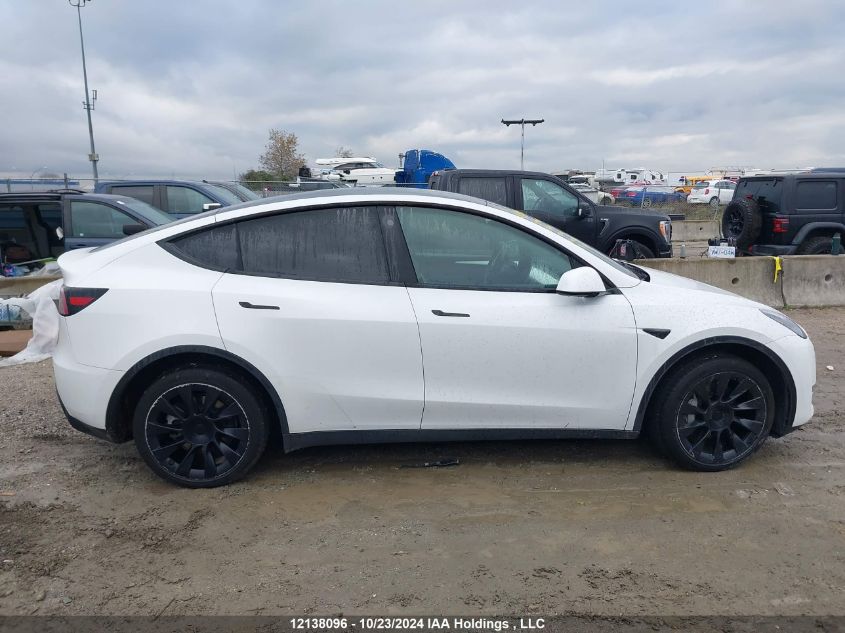 2023 Tesla Model Y VIN: 7SAYGDEE9PF692901 Lot: 12138096