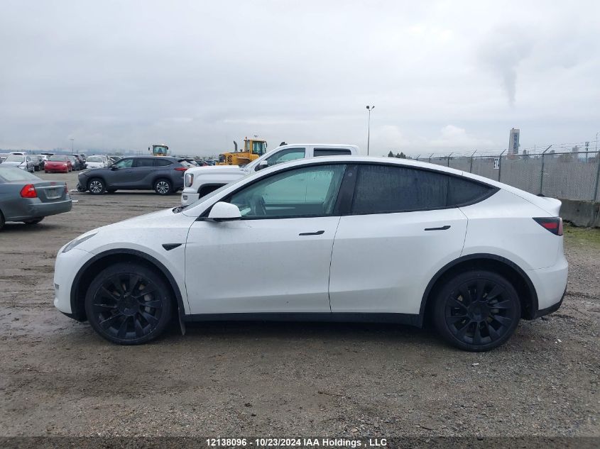 2023 Tesla Model Y VIN: 7SAYGDEE9PF692901 Lot: 12138096