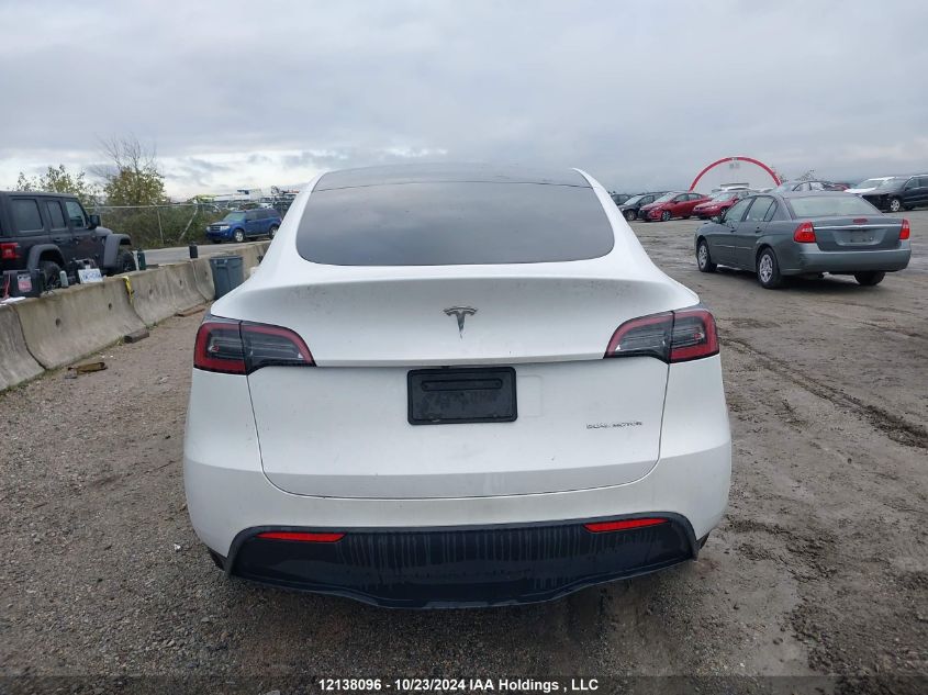 2023 Tesla Model Y VIN: 7SAYGDEE9PF692901 Lot: 12138096