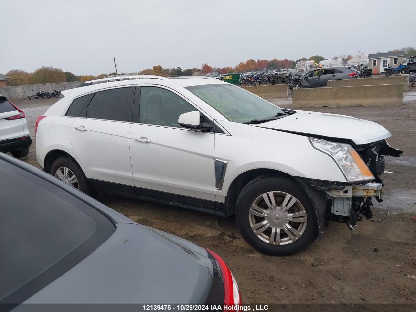 2014 Cadillac Srx VIN: 3GYFNEE33ES606978 Lot: 12139475