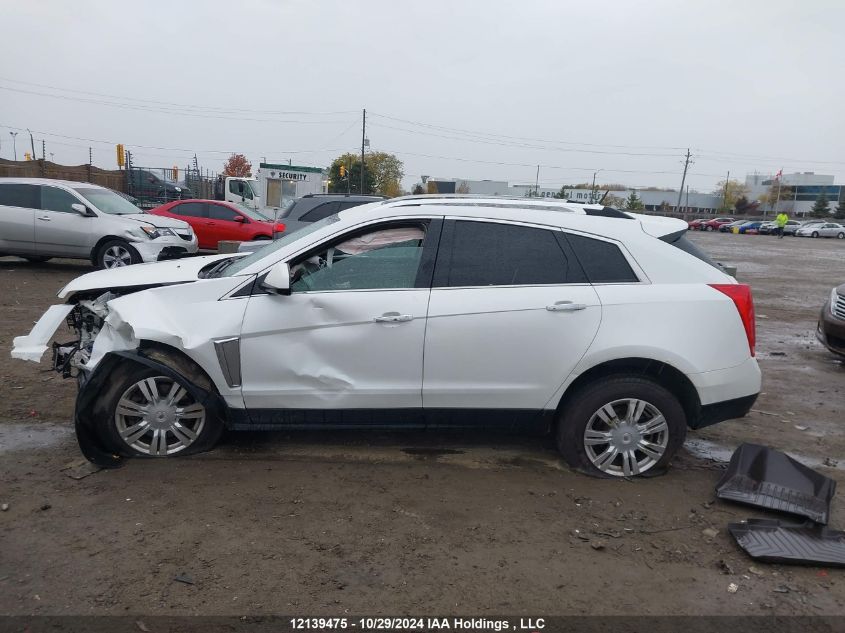 2014 Cadillac Srx VIN: 3GYFNEE33ES606978 Lot: 12139475