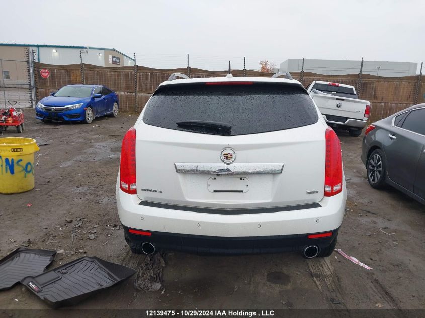 2014 Cadillac Srx VIN: 3GYFNEE33ES606978 Lot: 12139475