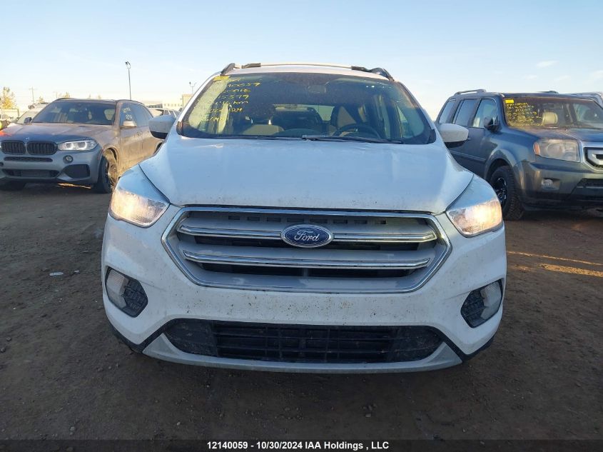 2018 Ford Escape Se VIN: 1FMCU9GD0JUC15379 Lot: 12140059