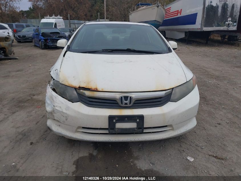 2012 Honda Civic Cpe VIN: 2HGFG3B59CH000595 Lot: 12140326