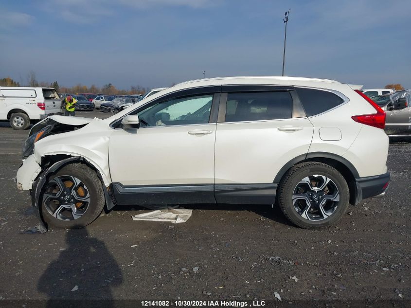 2018 Honda Cr-V VIN: 2HKRW2H97JH100668 Lot: 12141082