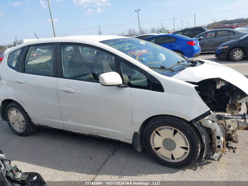 2009 Honda Fit Lx VIN: JHMGE88579S801782 Lot: 12142066