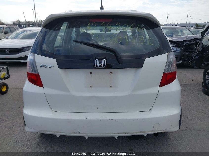 2009 Honda Fit Lx VIN: JHMGE88579S801782 Lot: 12142066