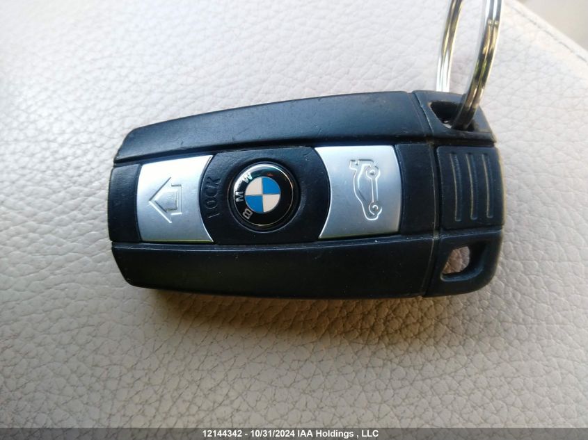 2009 BMW 3 Series VIN: WBAPL33529A405599 Lot: 12144342