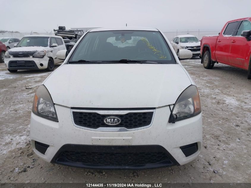 2010 Kia Rio Lx/Sx VIN: KNADH5B3XA6606206 Lot: 12144435