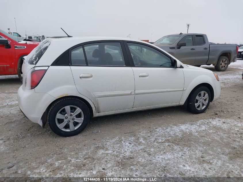 2010 Kia Rio Lx/Sx VIN: KNADH5B3XA6606206 Lot: 12144435