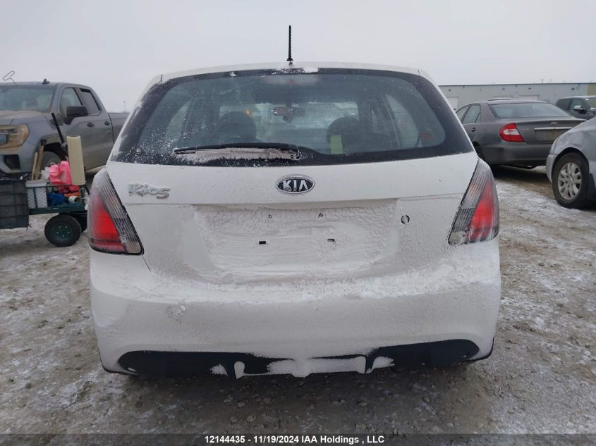 2010 Kia Rio Lx/Sx VIN: KNADH5B3XA6606206 Lot: 12144435