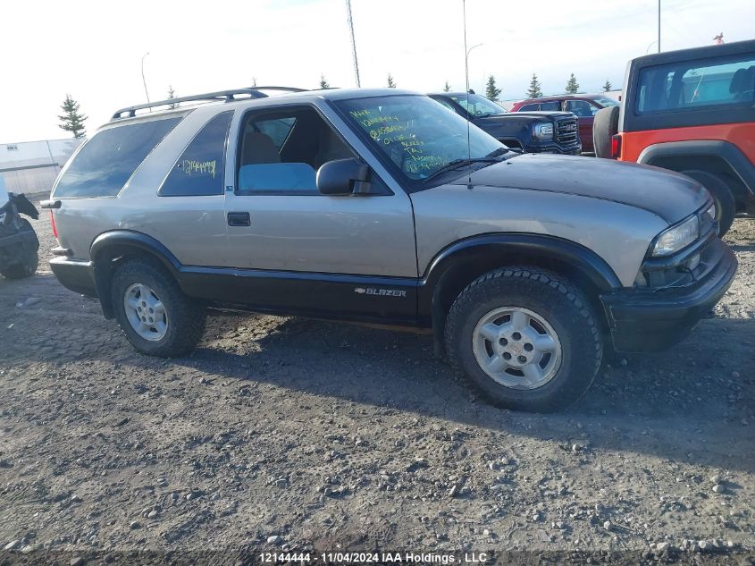 2001 Chevrolet Blazer VIN: 1GNCT18WX1K180975 Lot: 12144444