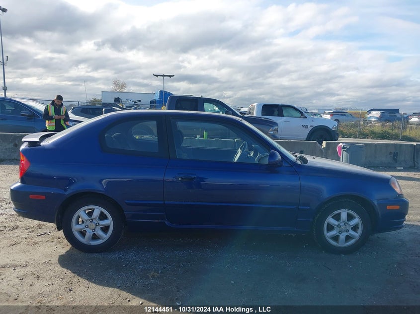 2006 Hyundai Accent Gt/Gl/Gls VIN: KMHCG35C96U357803 Lot: 12144451