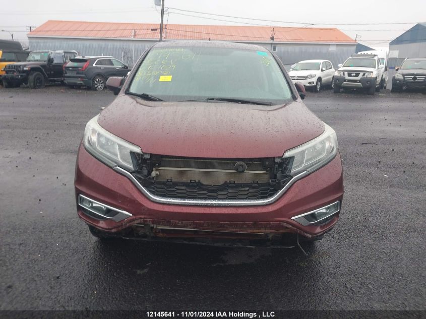 2015 Honda Cr-V VIN: 2HKRM4H51FH127029 Lot: 12145641