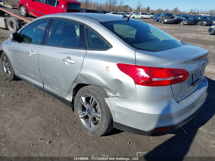 2018 Ford Focus VIN: 1FADP3FE7JL290373 Lot: 12145658