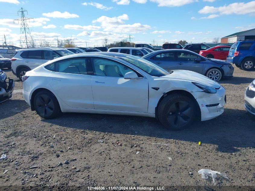 2019 Tesla Model 3 VIN: 5YJ3E1EB2KF409412 Lot: 12146806