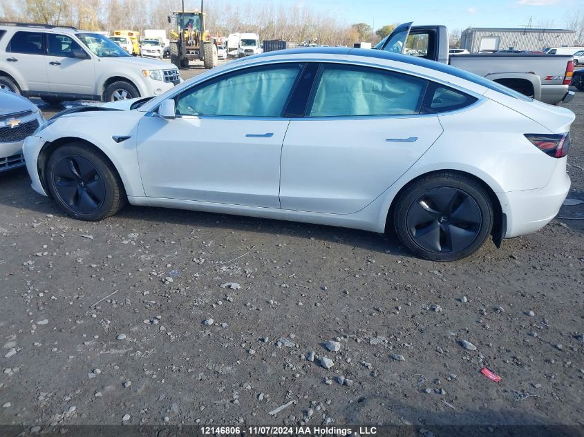 2019 Tesla Model 3 VIN: 5YJ3E1EB2KF409412 Lot: 12146806