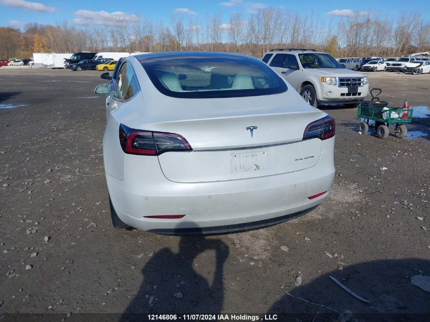 2019 Tesla Model 3 VIN: 5YJ3E1EB2KF409412 Lot: 12146806