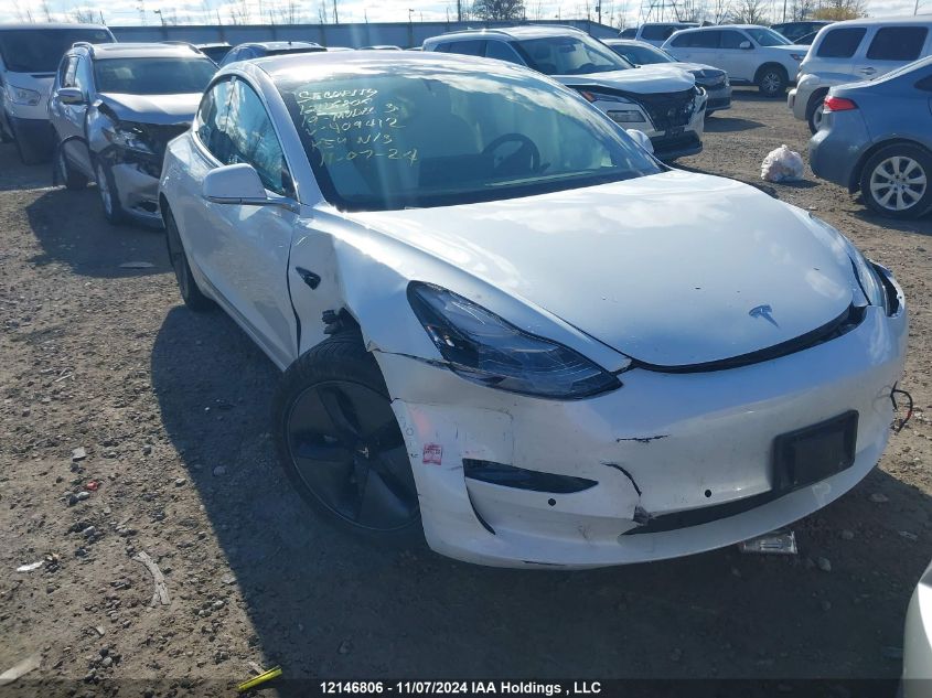 2019 Tesla Model 3 VIN: 5YJ3E1EB2KF409412 Lot: 12146806