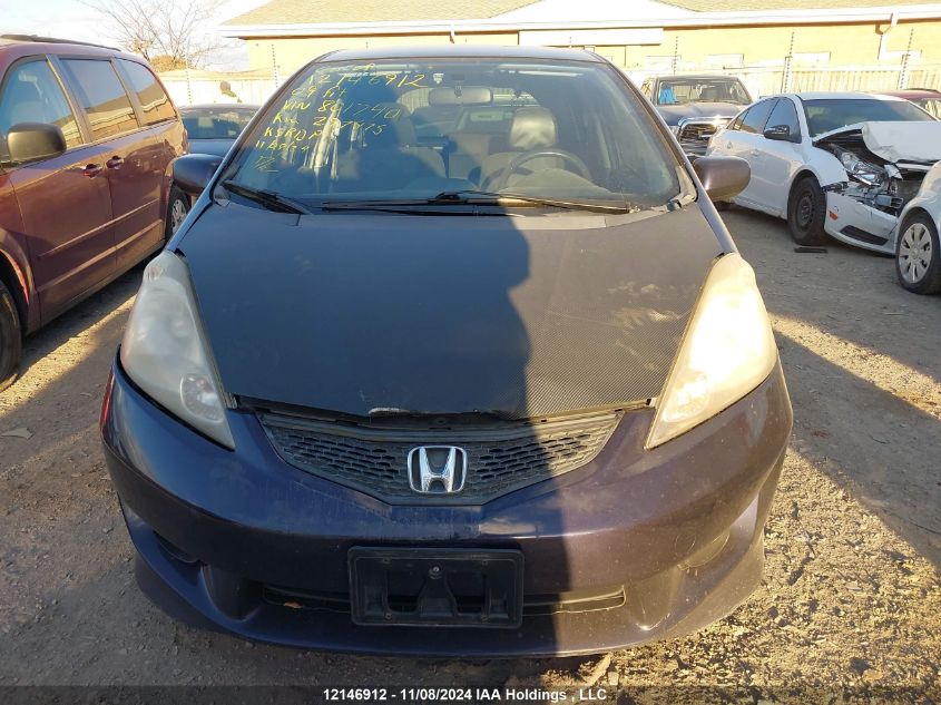 2009 Honda Fit VIN: JHMGE888X9S801740 Lot: 12146912