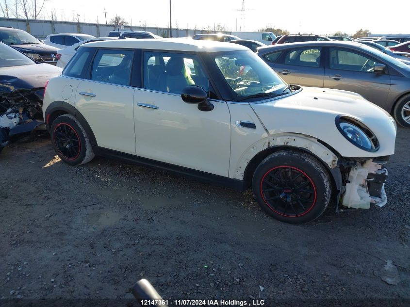 2016 Mini Cooper Hardtop 5 Door VIN: WMWXU1C50G2D12673 Lot: 12147361