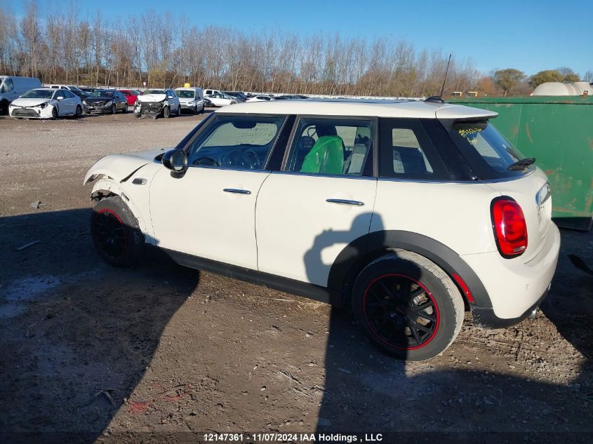 2016 Mini Cooper Hardtop 5 Door VIN: WMWXU1C50G2D12673 Lot: 12147361