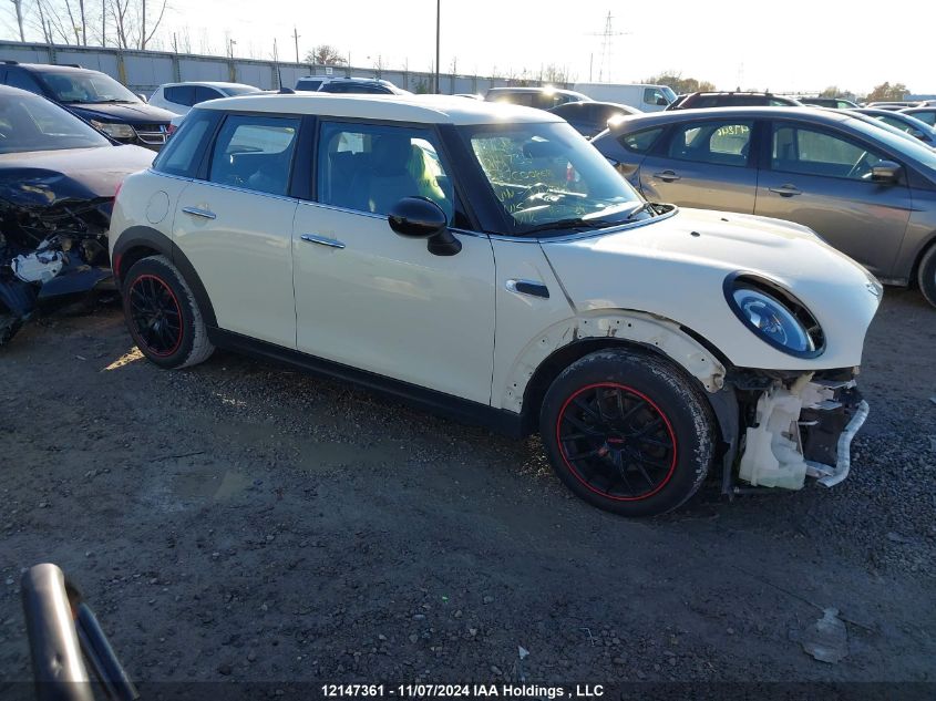 2016 Mini Cooper Hardtop 5 Door VIN: WMWXU1C50G2D12673 Lot: 12147361