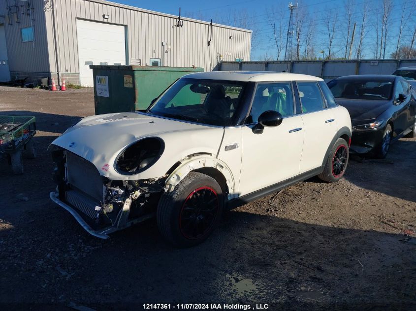 2016 Mini Cooper Hardtop 5 Door VIN: WMWXU1C50G2D12673 Lot: 12147361