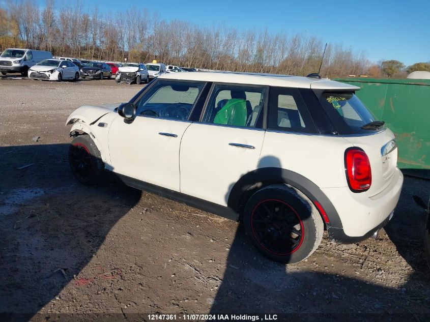 2016 Mini Cooper Hardtop 5 Door VIN: WMWXU1C50G2D12673 Lot: 12147361