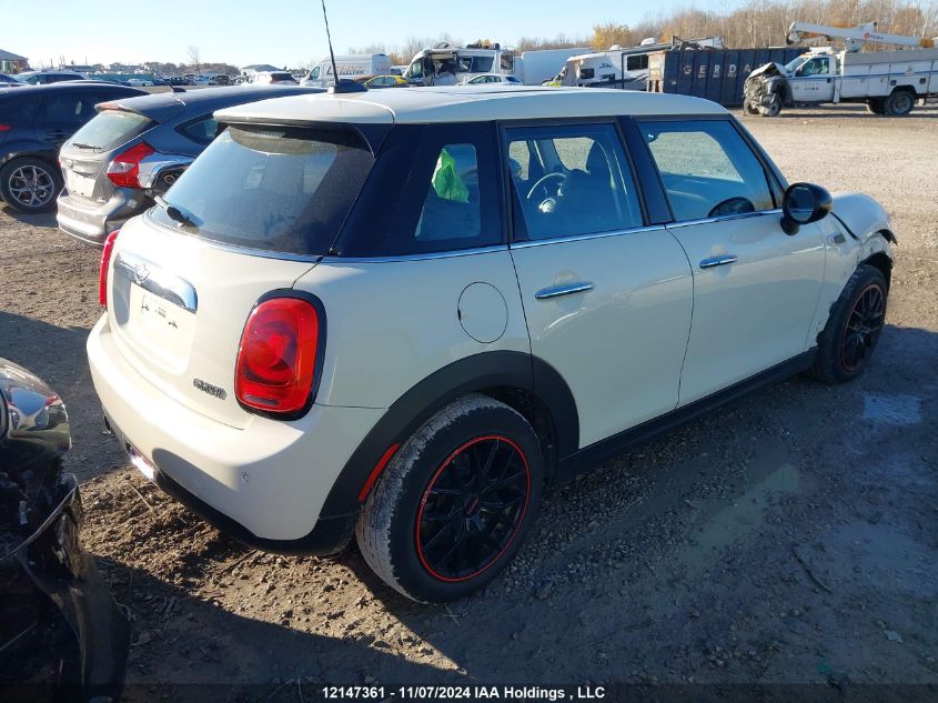 2016 Mini Cooper Hardtop 5 Door VIN: WMWXU1C50G2D12673 Lot: 12147361