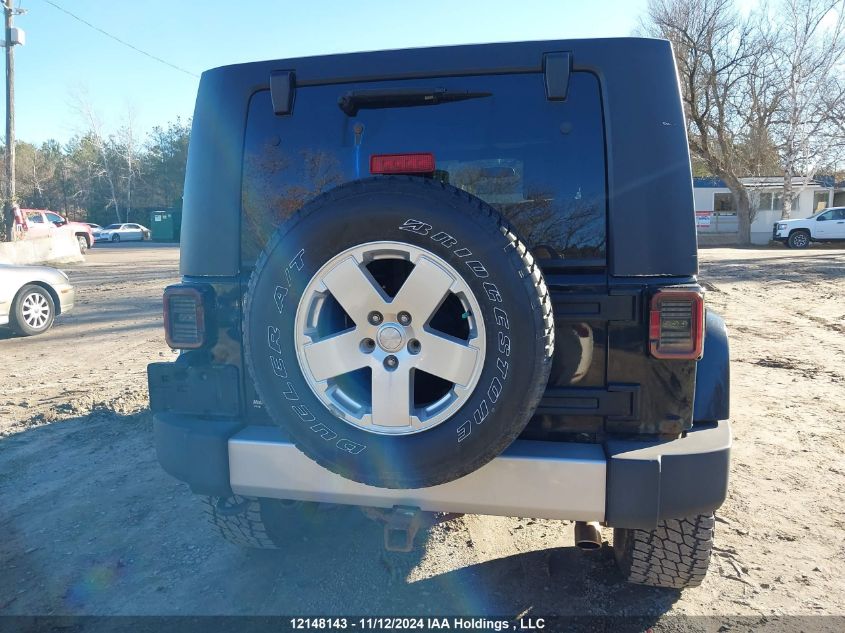 2010 Jeep Wrangler Unlimited Sahara VIN: IJ4BA5HI8AL20786I Lot: 12148143