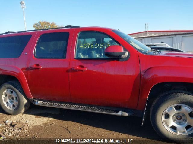 2014 Chevrolet Suburban VIN: 1GNSKJE77ER216811 Lot: 12148259