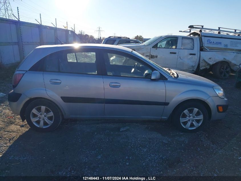 2009 Kia Rio VIN: KNADE243396469545 Lot: 12148443