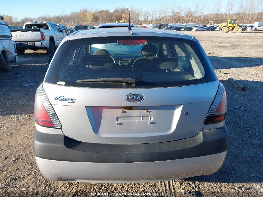 2009 Kia Rio VIN: KNADE243396469545 Lot: 12148443