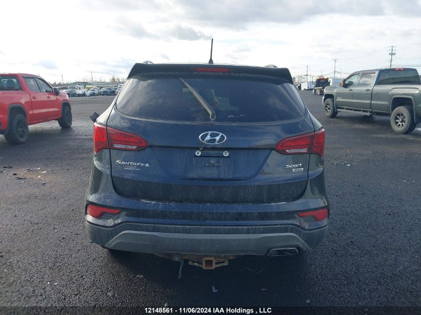 2018 Hyundai Santa Fe Sport 2.4 Base VIN: 5XYZTDLB3JG517226 Lot: 12148561