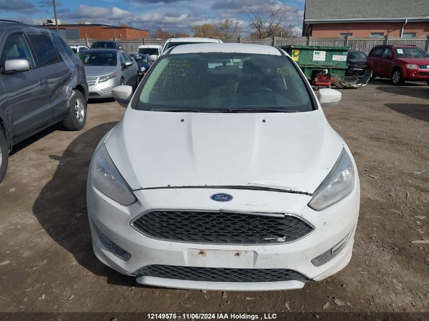 2018 Ford Focus Se VIN: 1FADP3F21JL263725 Lot: 12149575