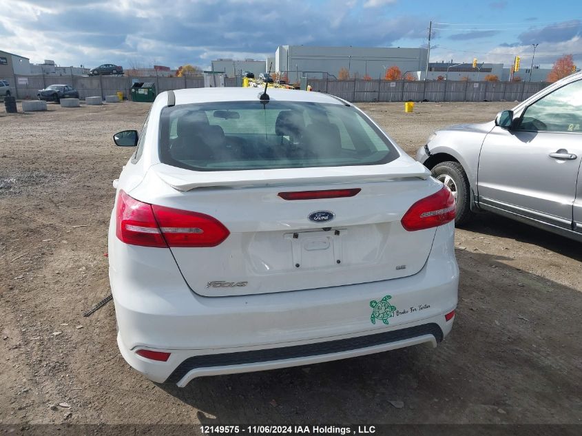 2018 Ford Focus Se VIN: 1FADP3F21JL263725 Lot: 12149575