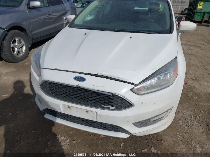 2018 Ford Focus Se VIN: 1FADP3F21JL263725 Lot: 12149575