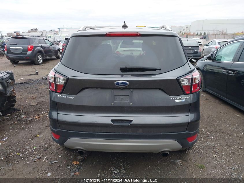 2018 Ford Escape Titanium VIN: 1FMCU9J90JUD31959 Lot: 12151216