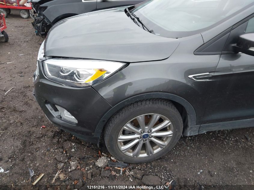 2018 Ford Escape Titanium VIN: 1FMCU9J90JUD31959 Lot: 12151216