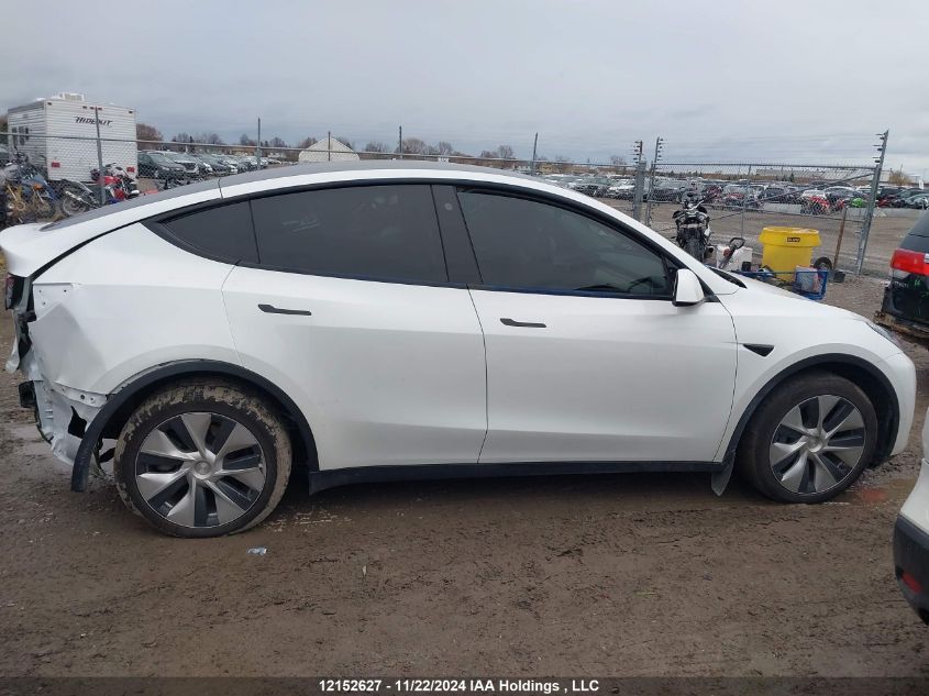 2023 Tesla Model Y VIN: 7SAYGDEE8PF592465 Lot: 12152627