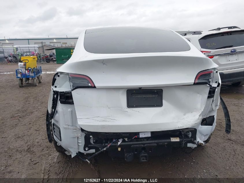 2023 Tesla Model Y VIN: 7SAYGDEE8PF592465 Lot: 12152627