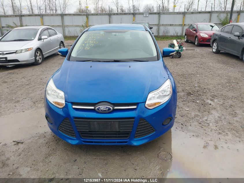 2014 Ford Focus VIN: 1FADP3F2XEL423557 Lot: 12153987