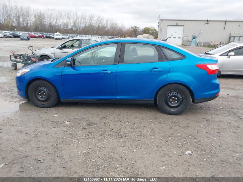 2014 Ford Focus VIN: 1FADP3F2XEL423557 Lot: 12153987