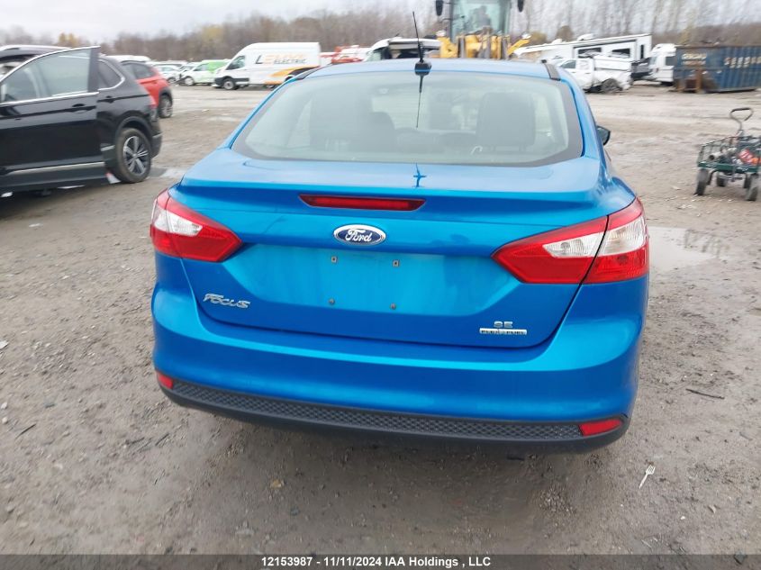 2014 Ford Focus VIN: 1FADP3F2XEL423557 Lot: 12153987