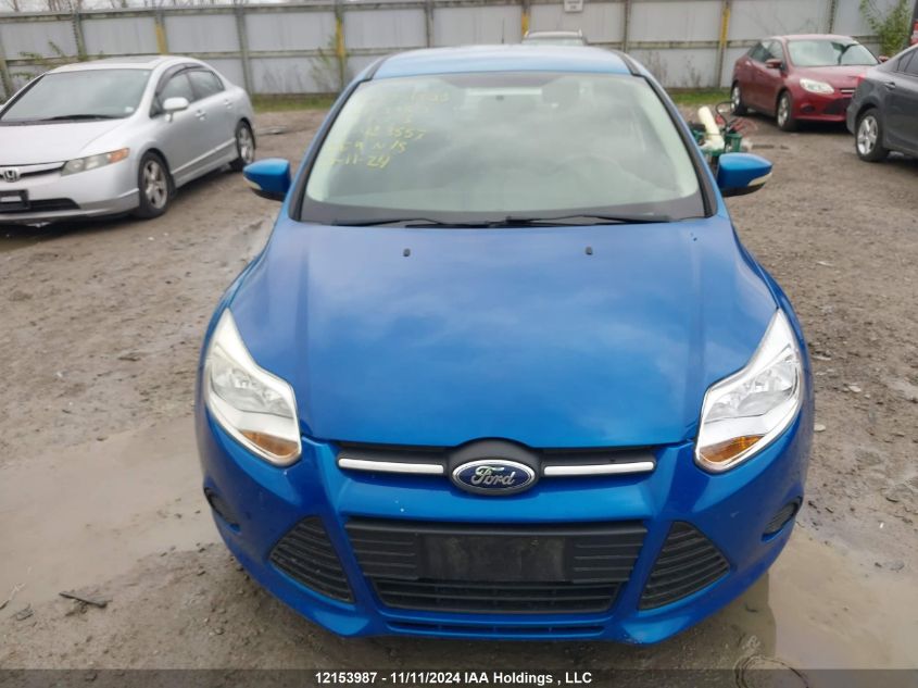 2014 Ford Focus VIN: 1FADP3F2XEL423557 Lot: 12153987