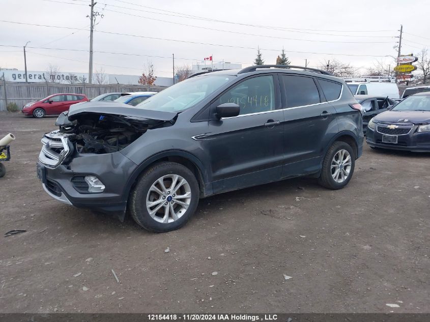 2018 Ford Escape Se VIN: 1FMCU9GDXJUC92048 Lot: 12154418