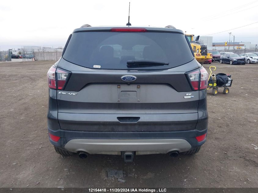 2018 Ford Escape Se VIN: 1FMCU9GDXJUC92048 Lot: 12154418