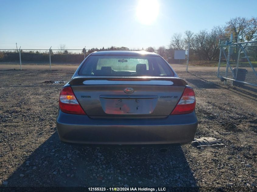 2003 Toyota Camry Le/Xle VIN: JTDBE32K730195710 Lot: 12155323