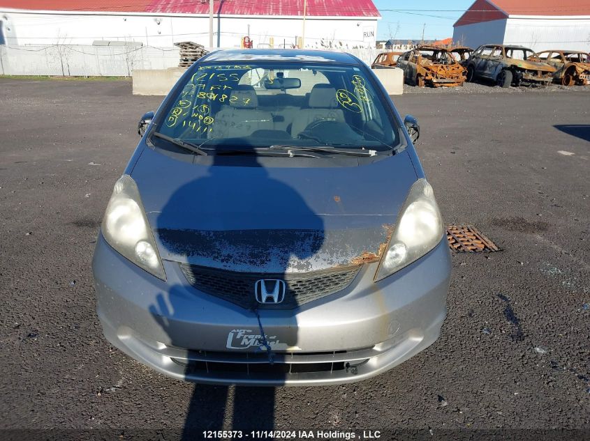 2009 Honda Fit VIN: JHMGE87249S801827 Lot: 12155373